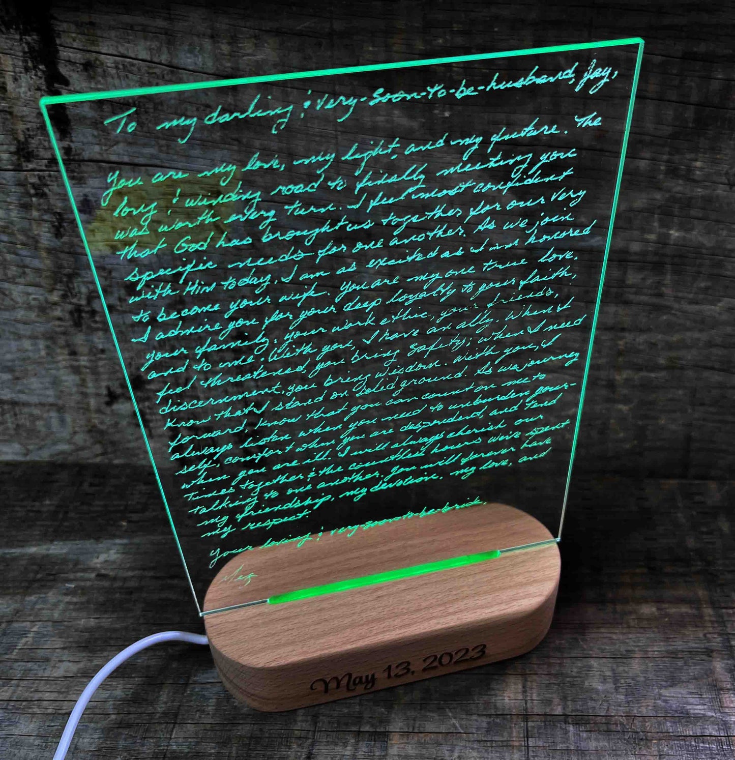 Handwriting engraved into LED Light Sign.