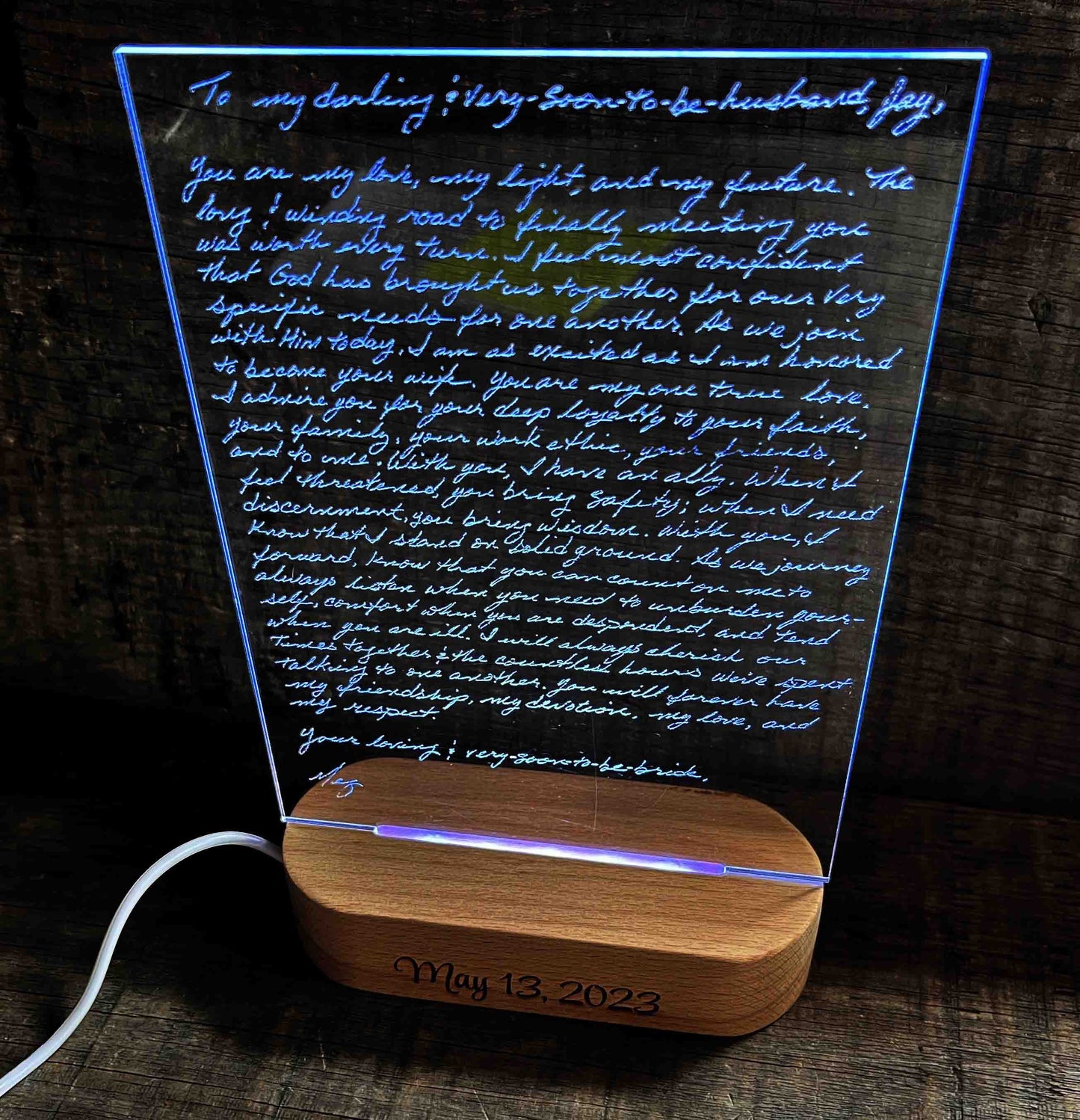 Handwriting engraved into LED Light Sign.