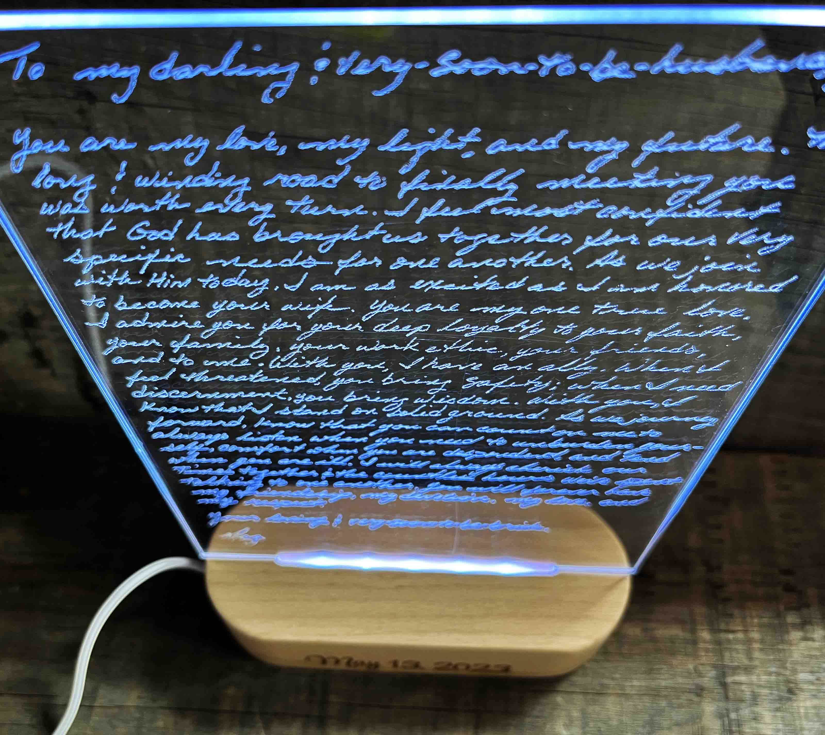 Handwriting engraved into LED Light Sign.