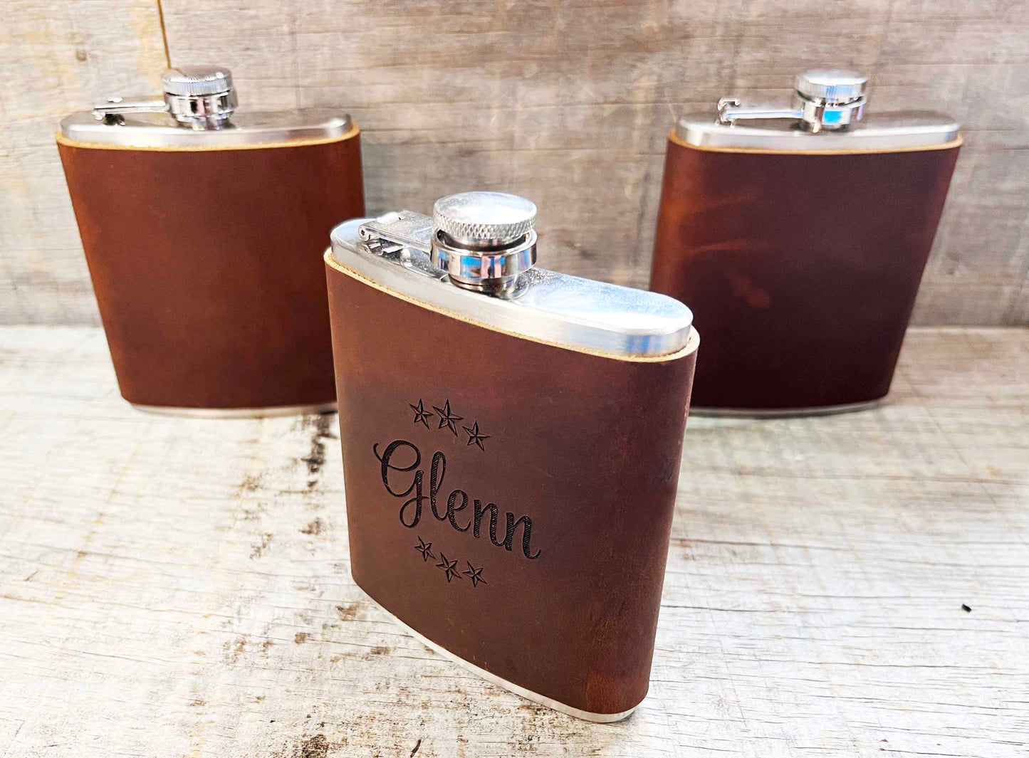 Cowboy Leather Engraved Flasks.