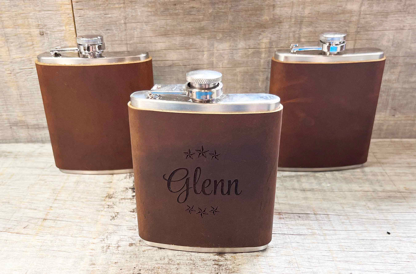 Cowboy Leather Engraved Flasks.