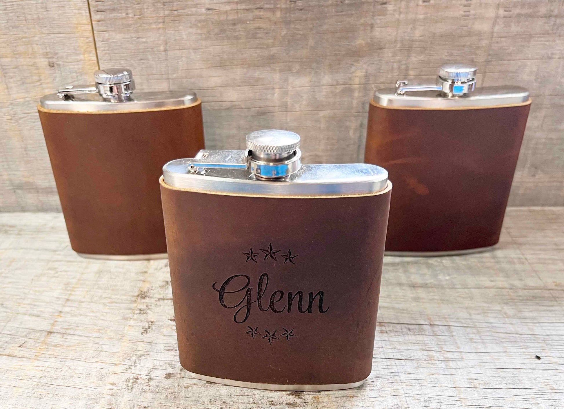 Cowboy Leather Engraved Flasks.