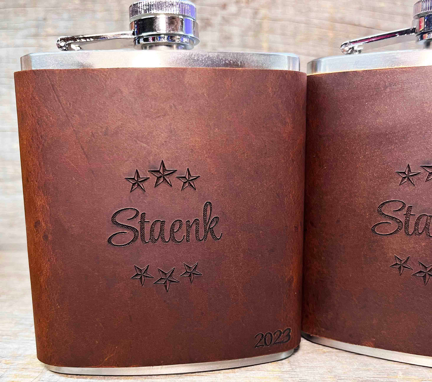 Cowboy Leather Engraved Flasks.