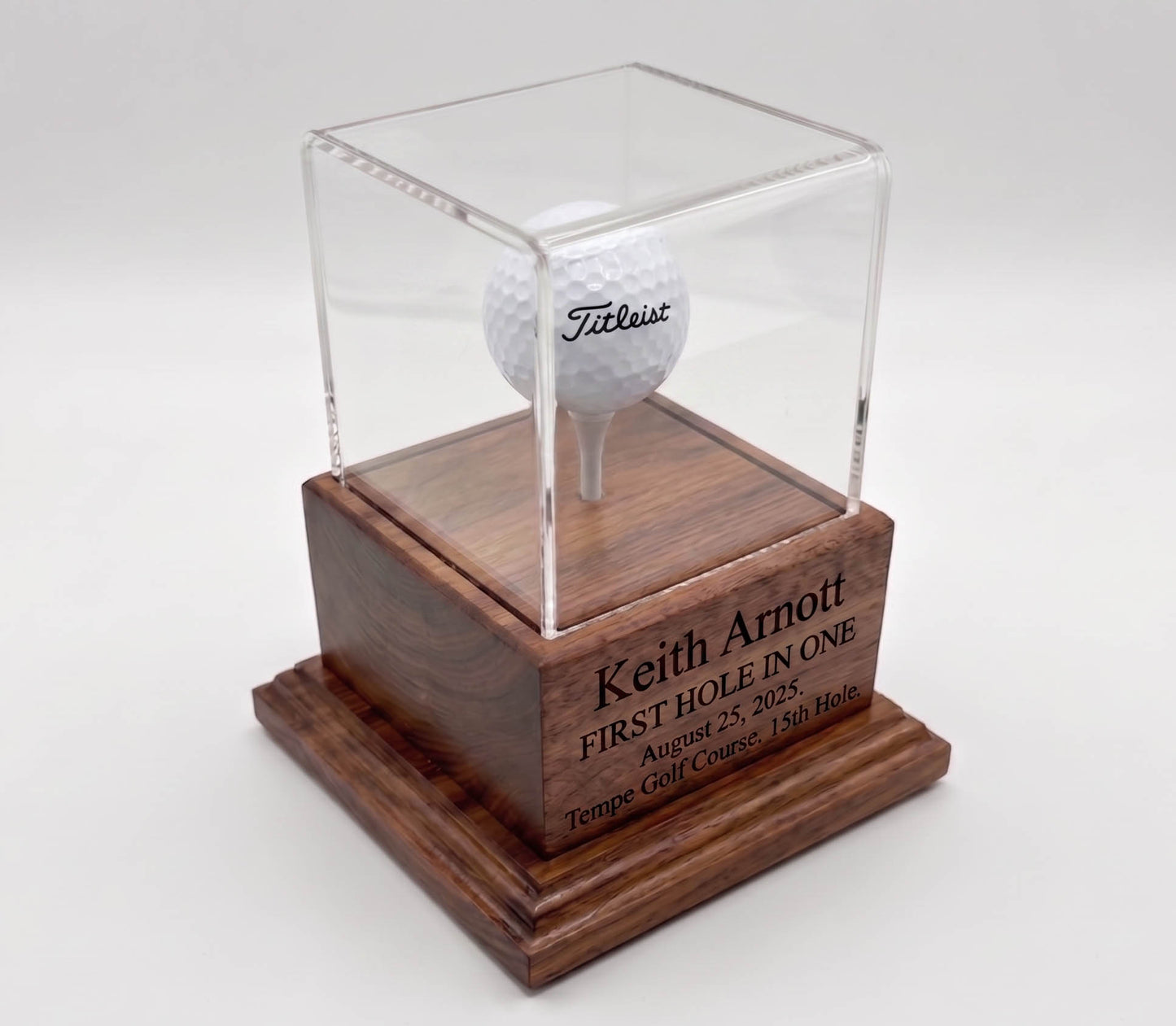 golf ball hole in one trophy case