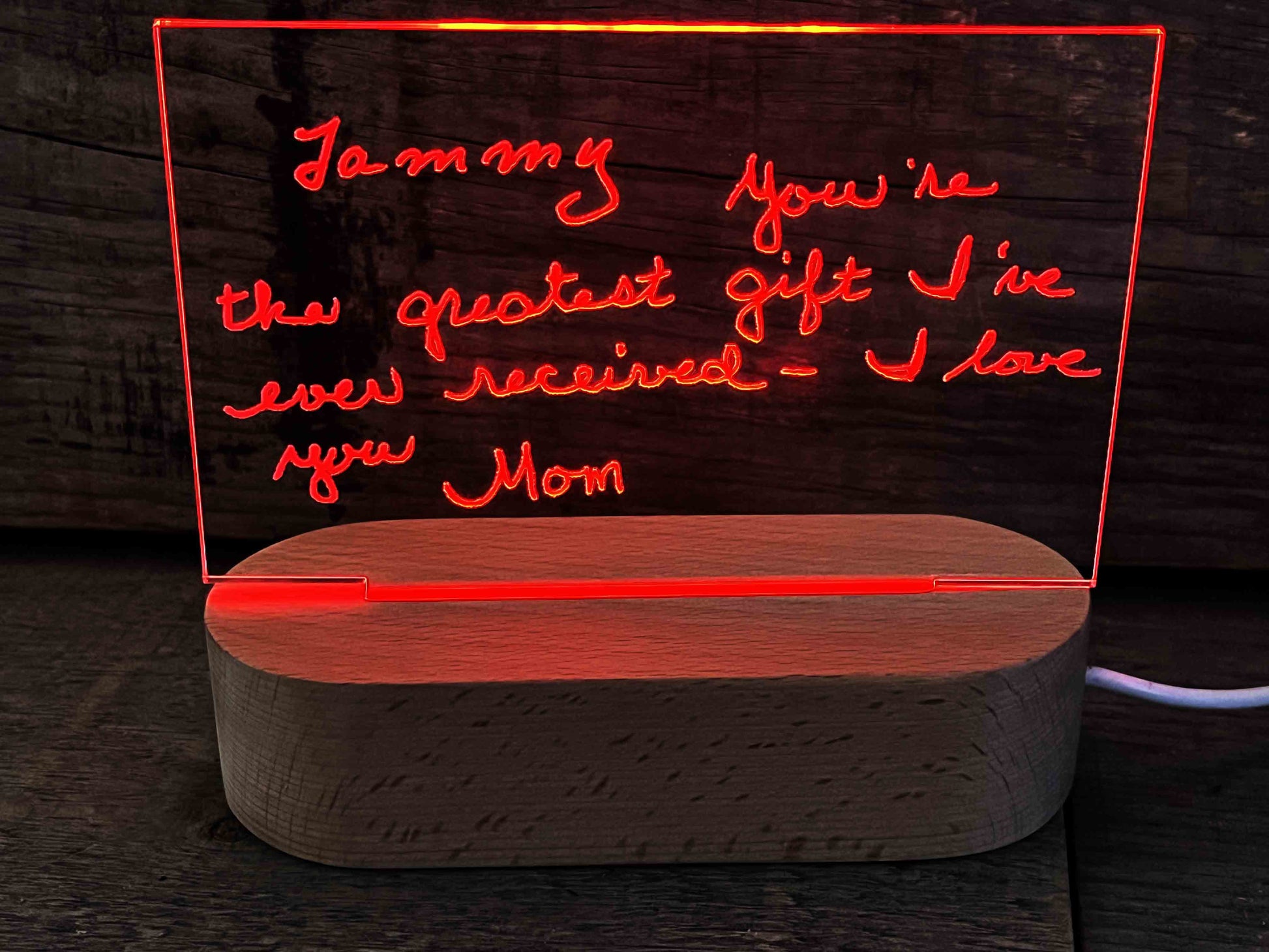 Handwriting engraved into LED Light Sign.