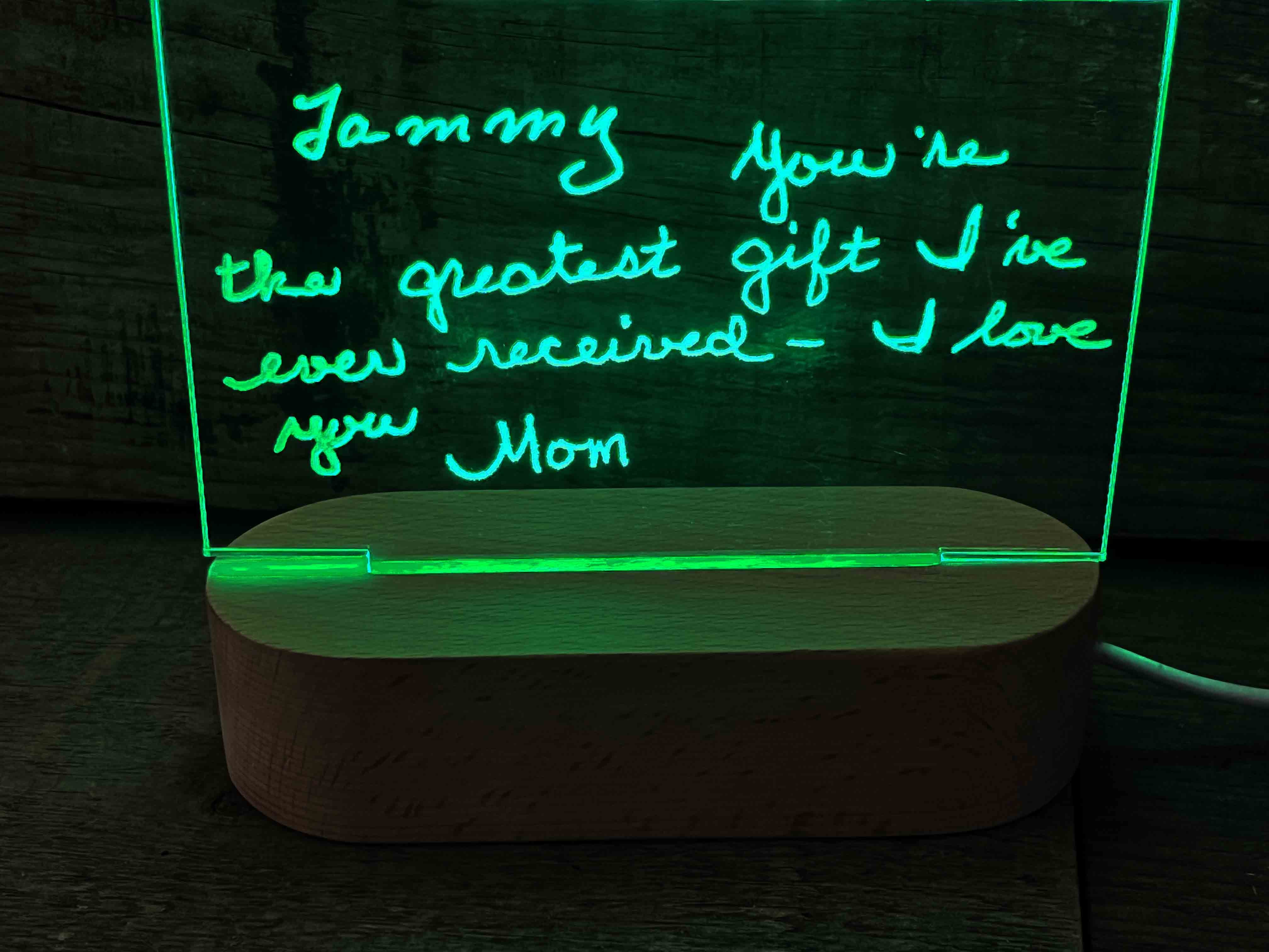 Handwriting engraved into LED Light Sign.