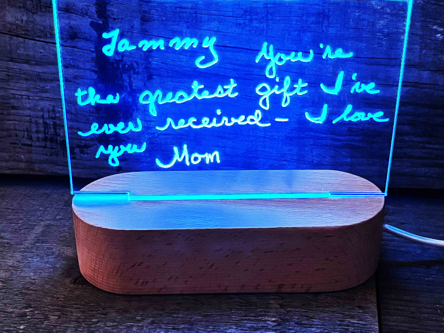 Handwriting engraved into LED Light Sign.