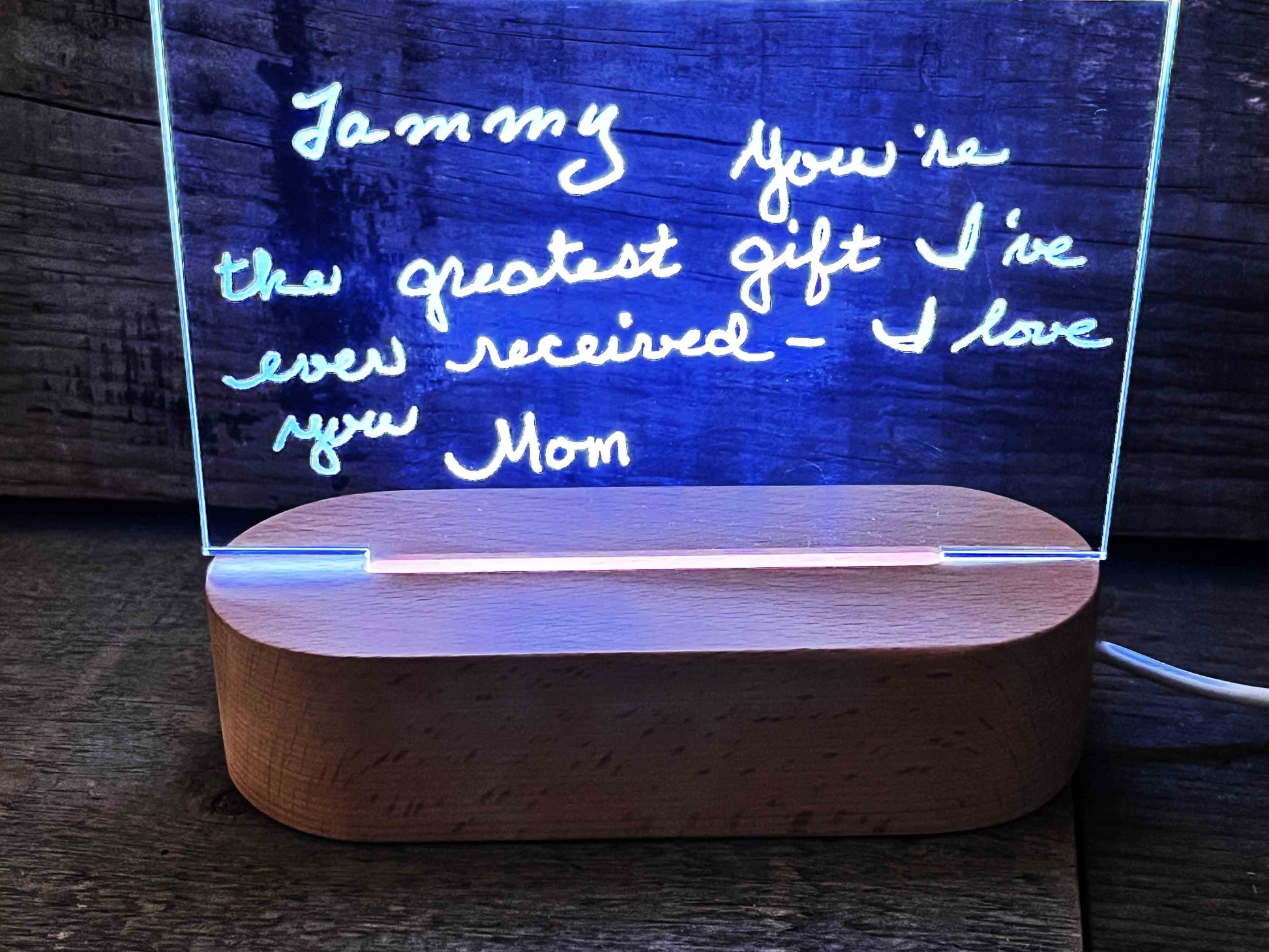 Handwriting engraved into LED Light Sign.