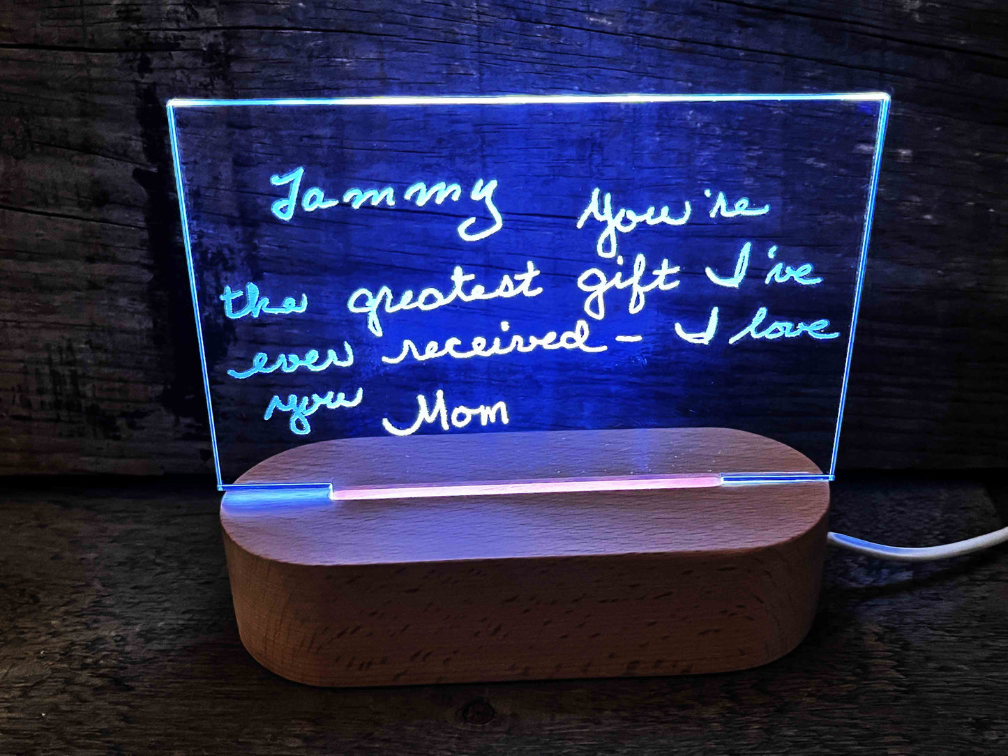 Handwriting engraved into LED Light Sign.