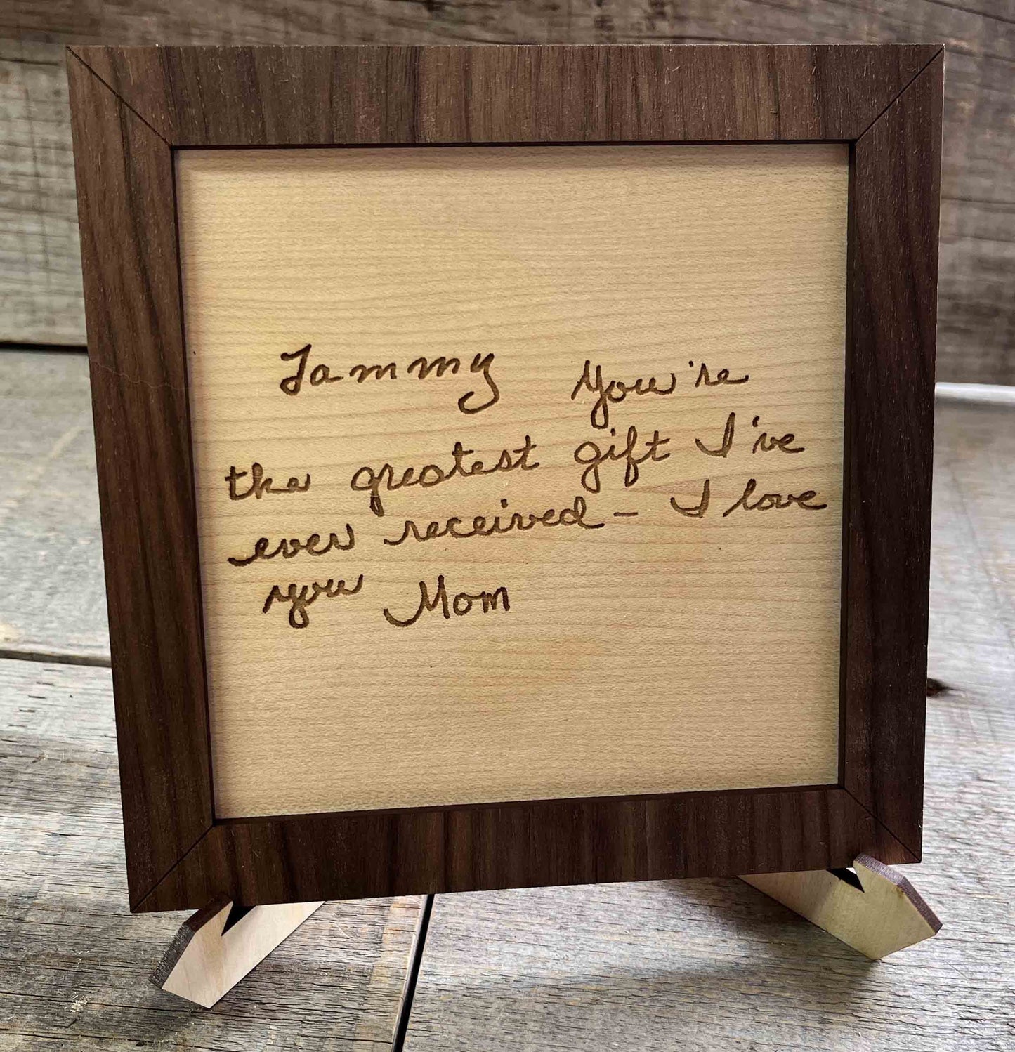 Handwriting engraved into Wood Sign.