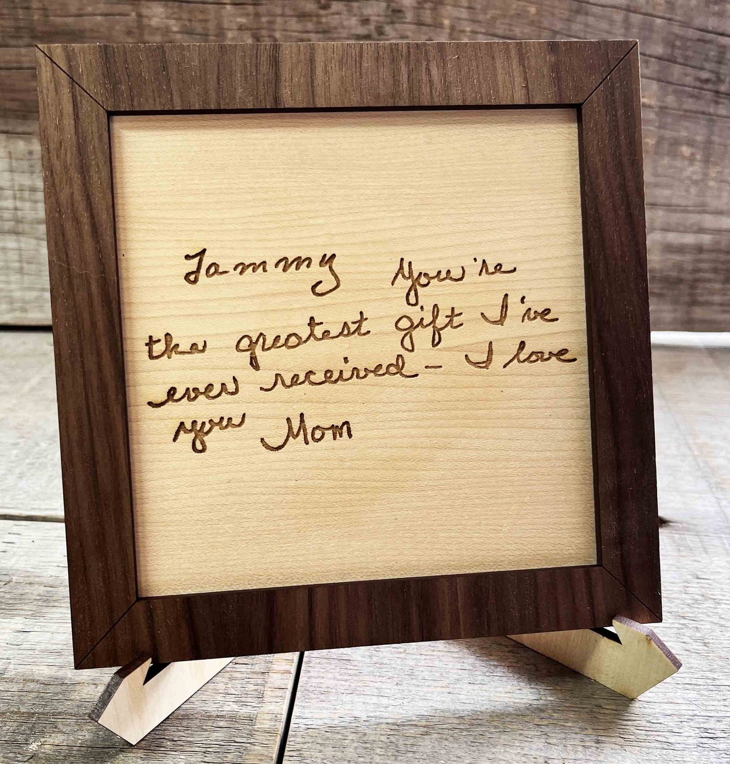 Handwriting engraved into Wood Sign.