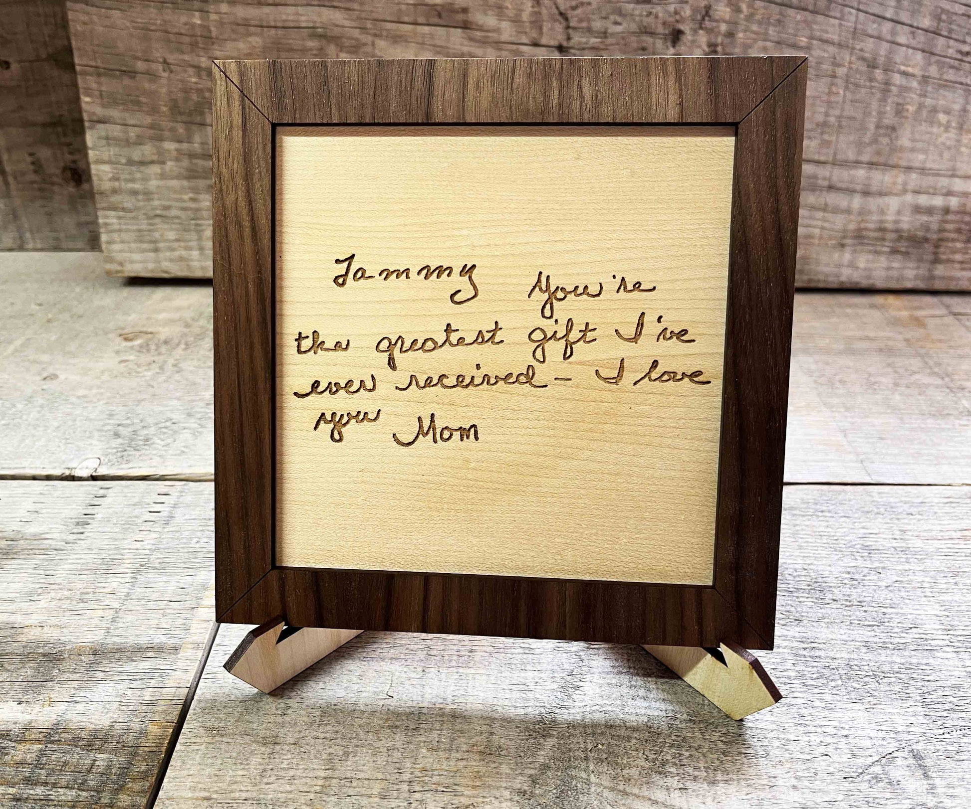 Handwriting engraved into Wood Sign.