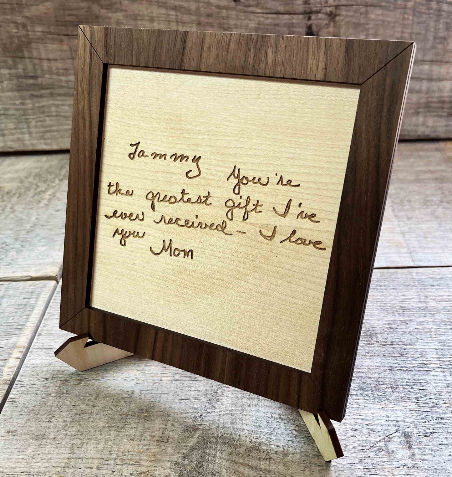 Handwriting engraved into Wood Sign.