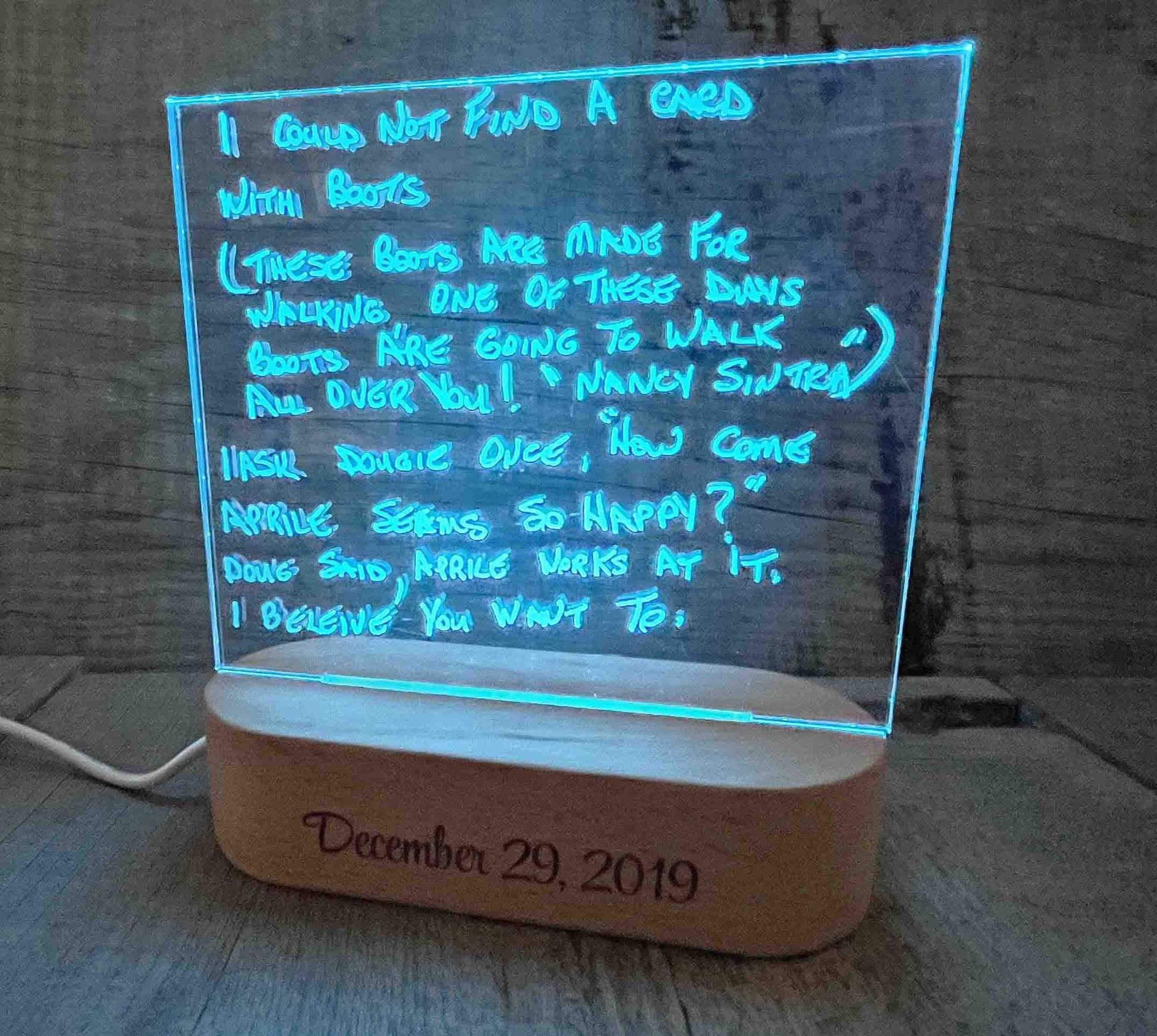 Handwriting engraved into LED Light Sign.