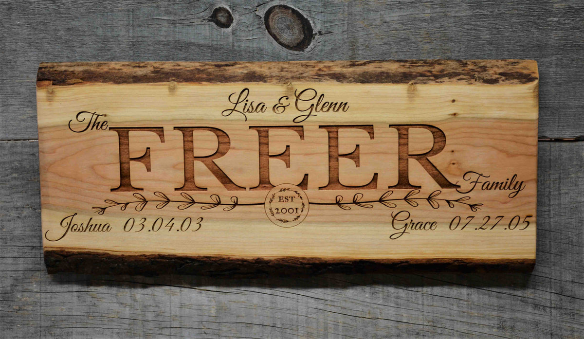 Cherry Wood Custom Signs: Family Name and Dates.