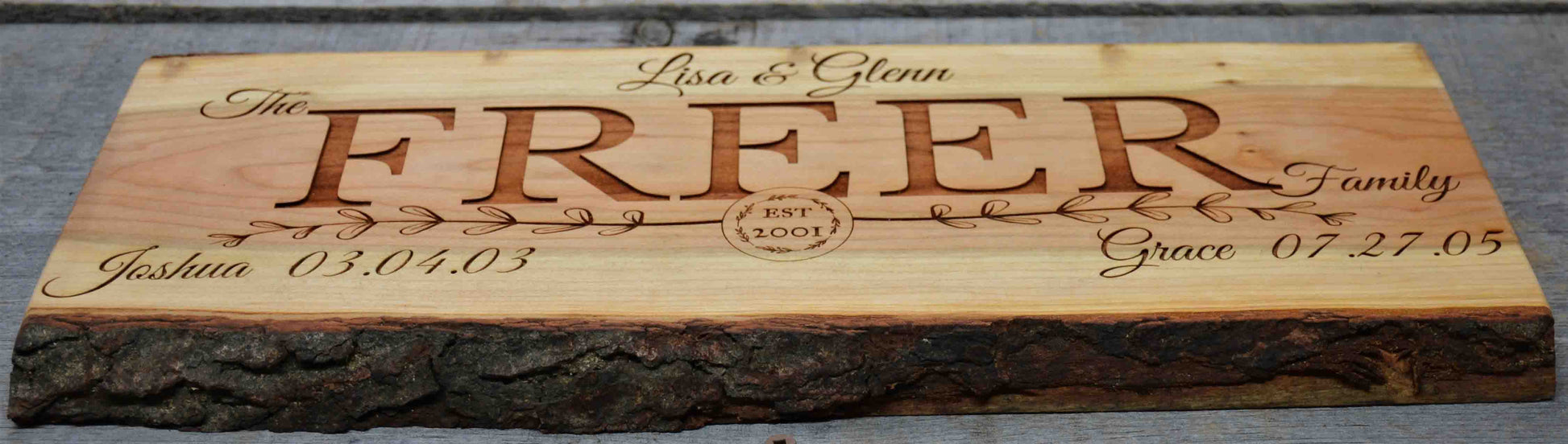 Cherry Wood Custom Signs: Family Name and Dates.