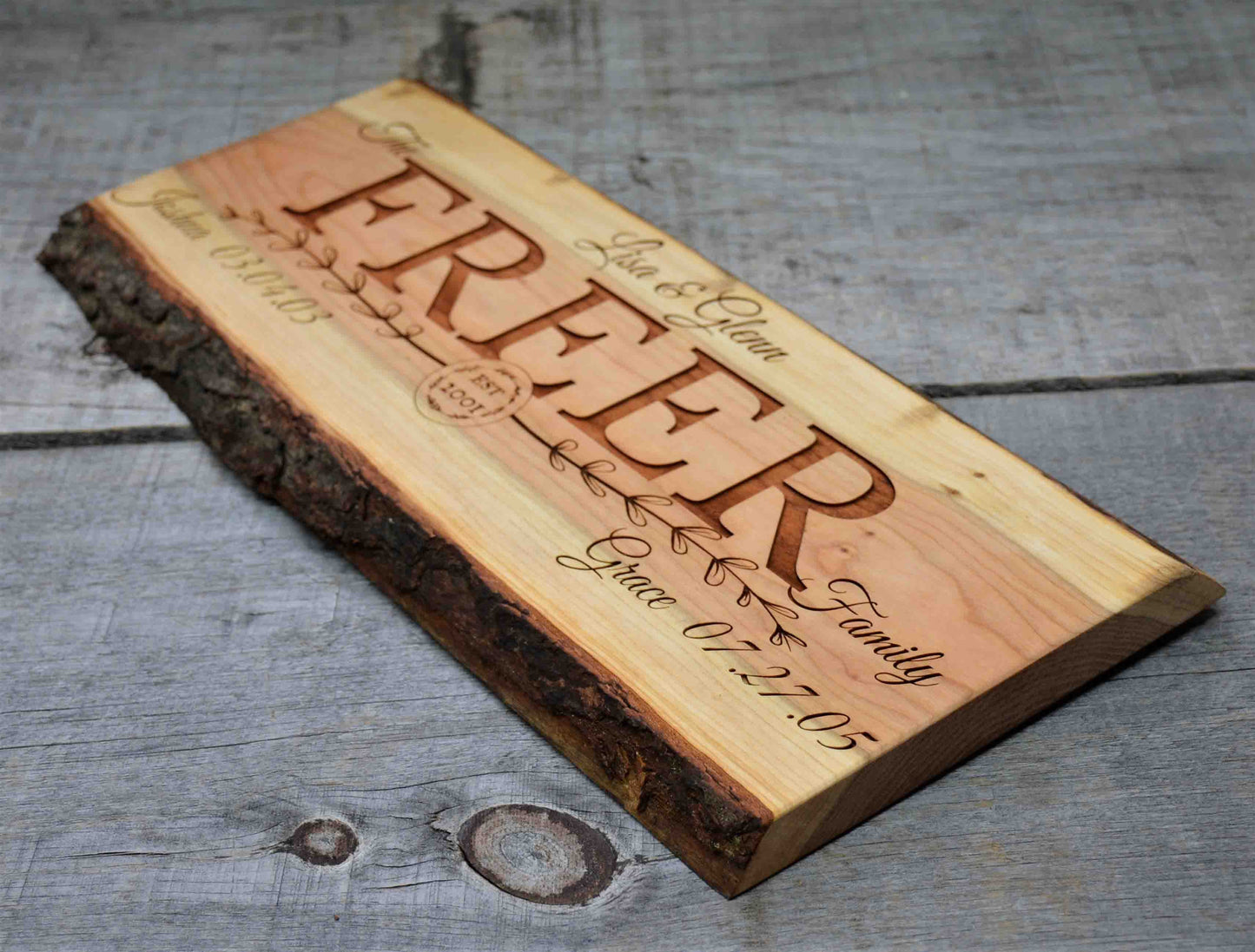 Cherry Wood Custom Signs: Family Name and Dates.