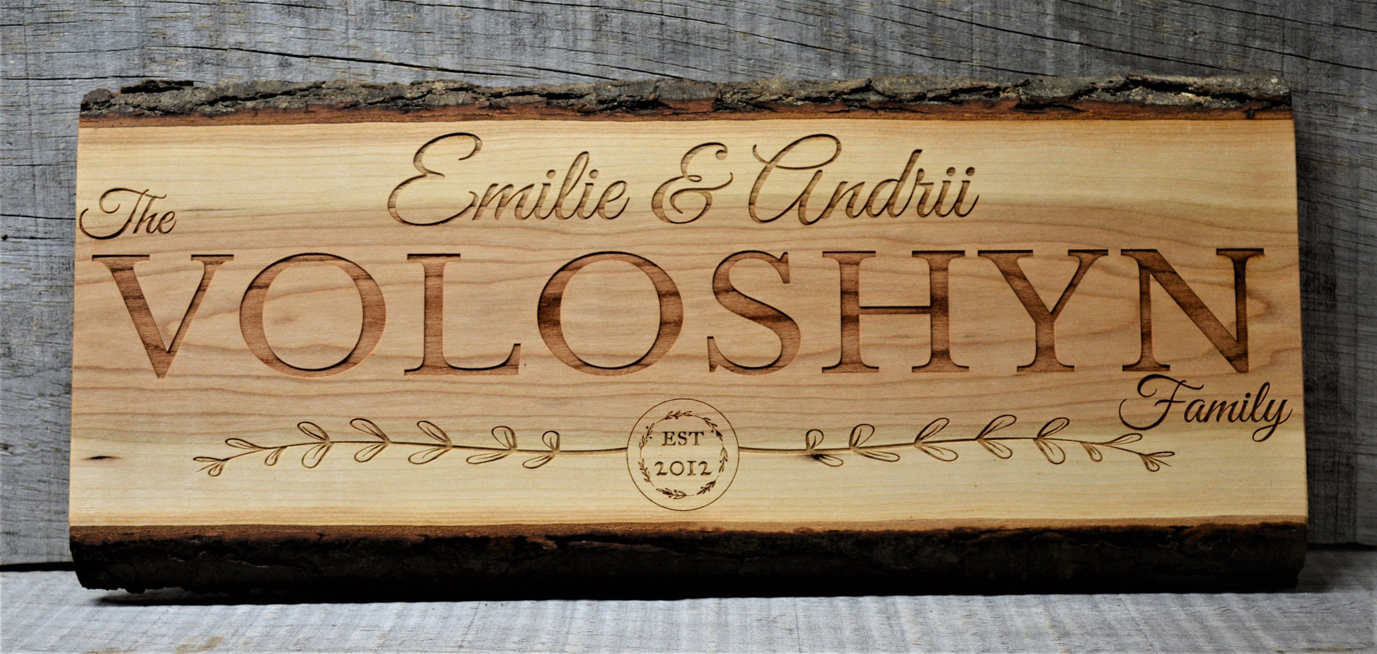 Cherry Wood Custom Signs: Family Name and Dates.