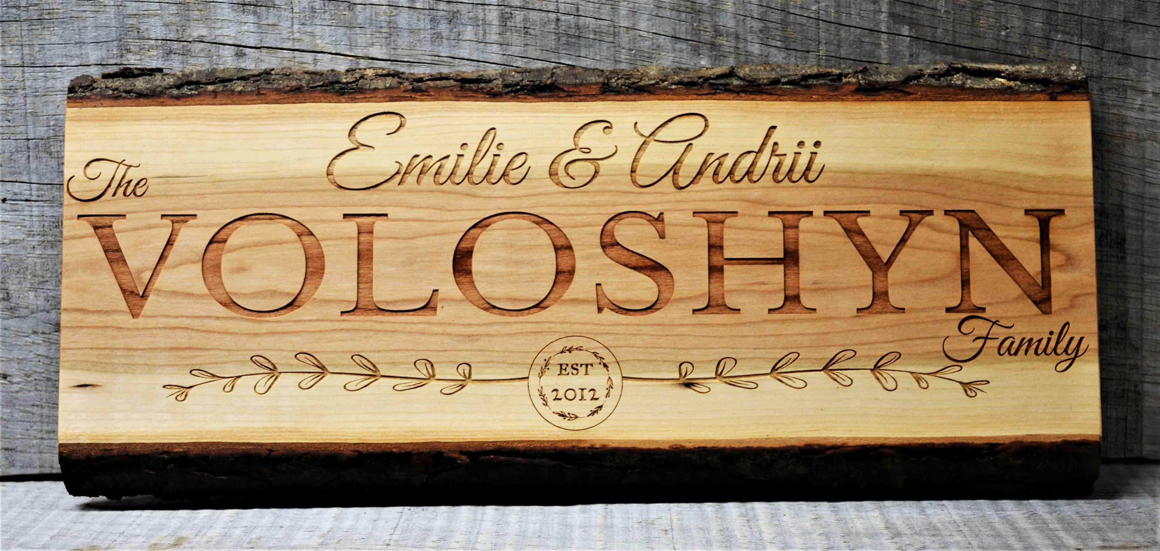 Cherry Wood Custom Signs: Family Name and Dates.