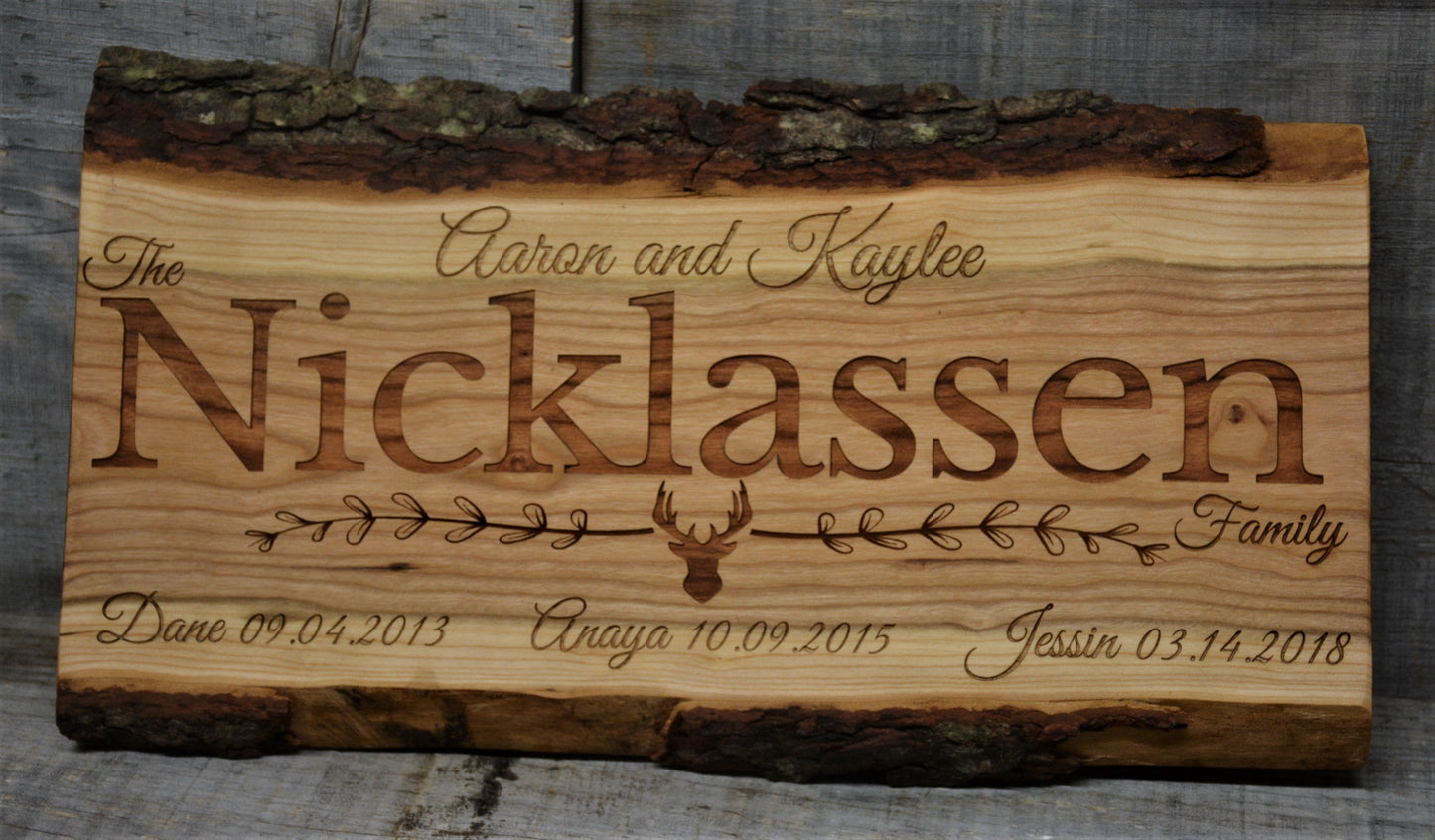 Cherry Wood Custom Signs: Family Name and Dates.