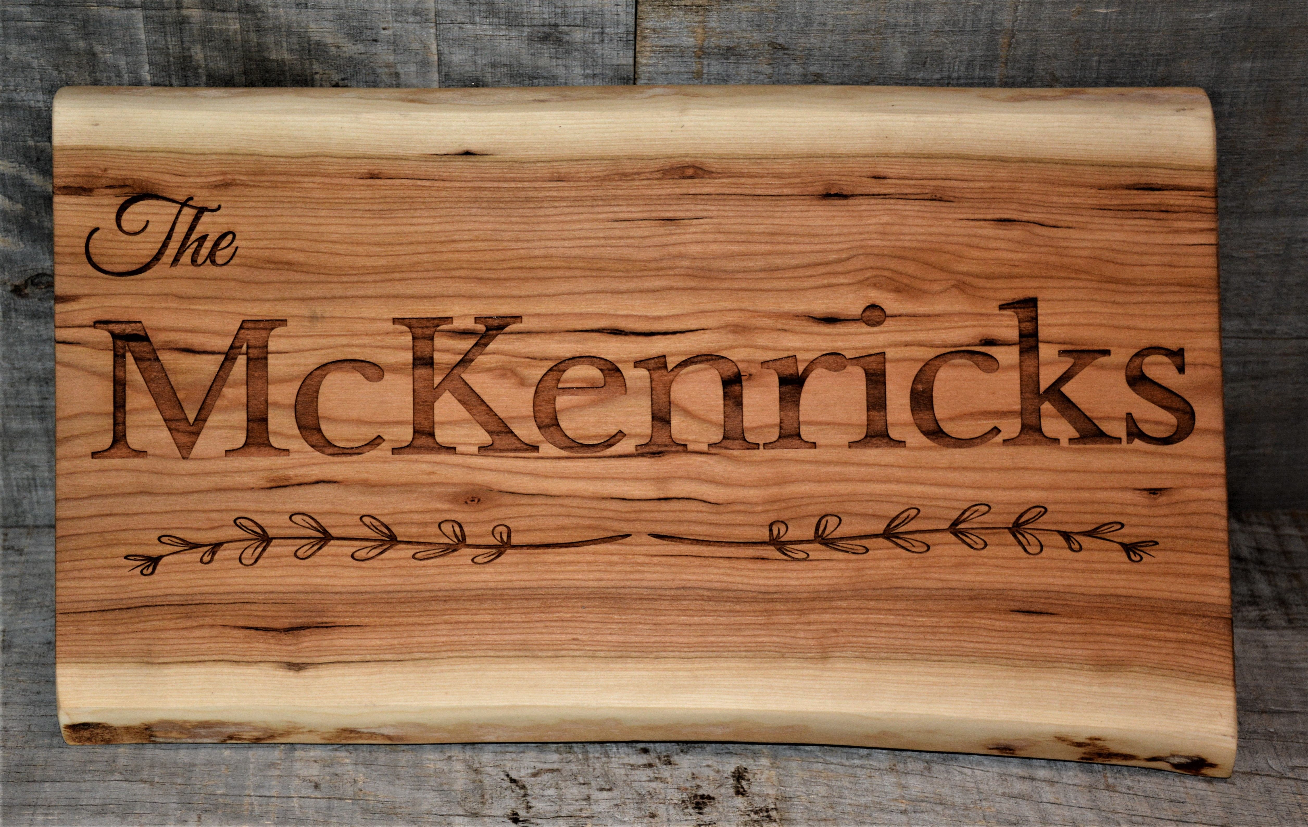 Cherry Wood Custom Signs: Family Name and Dates.