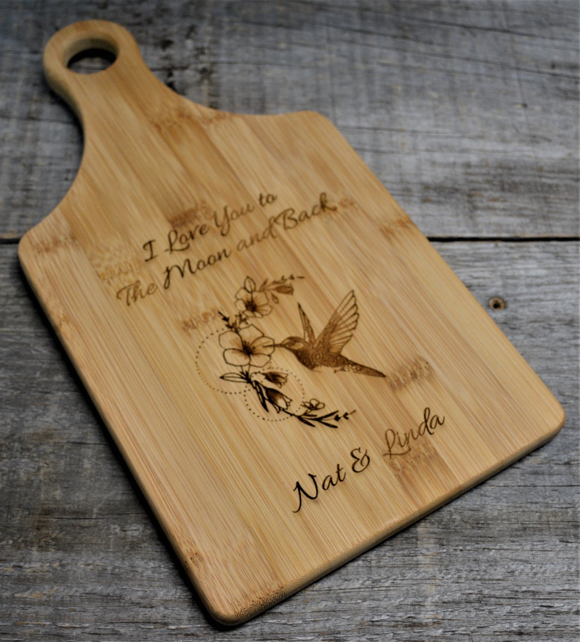 Bamboo Paddle Shape Cutting Board Design 86.