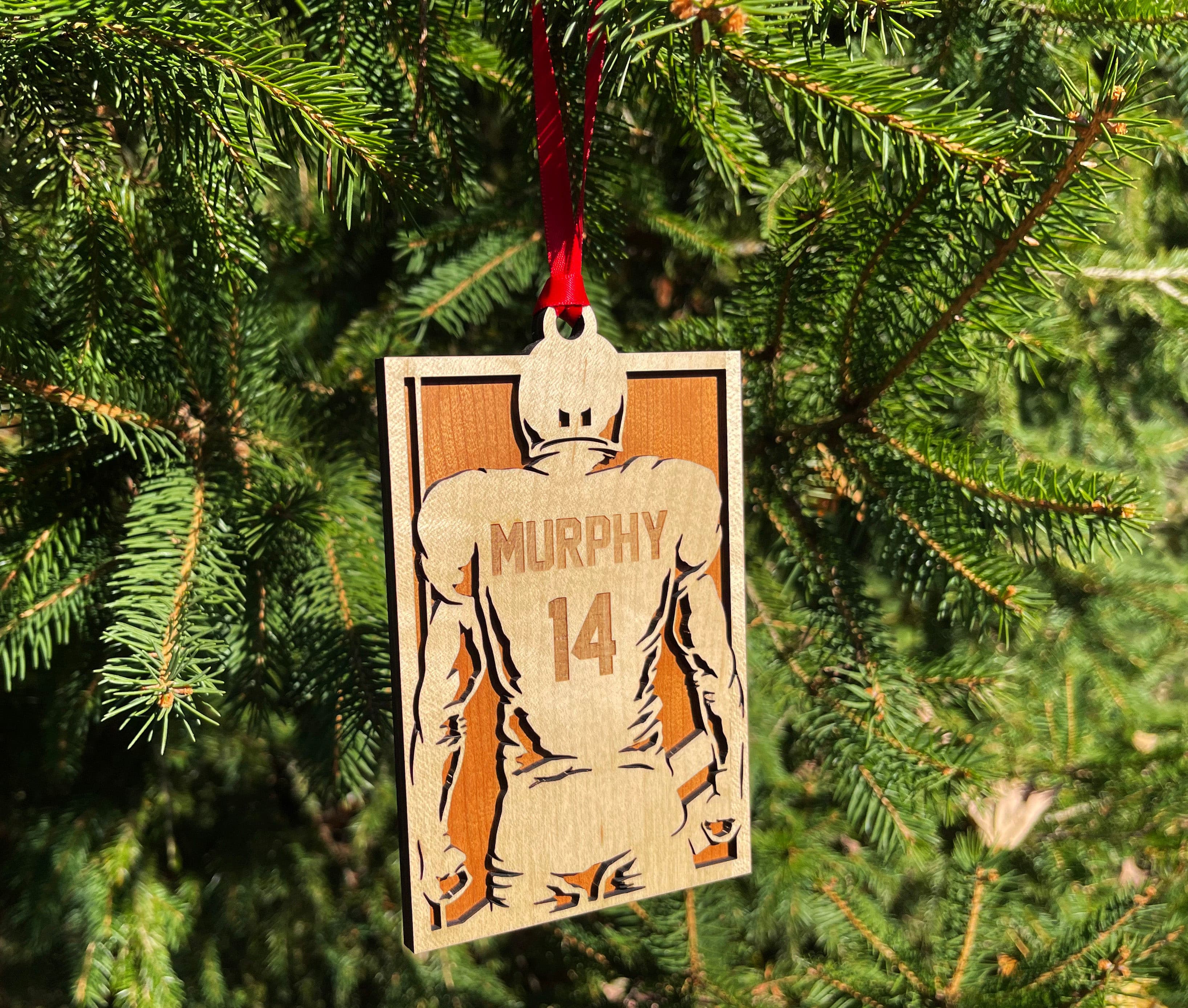 Football Player Jersey Christmas Ornament.
