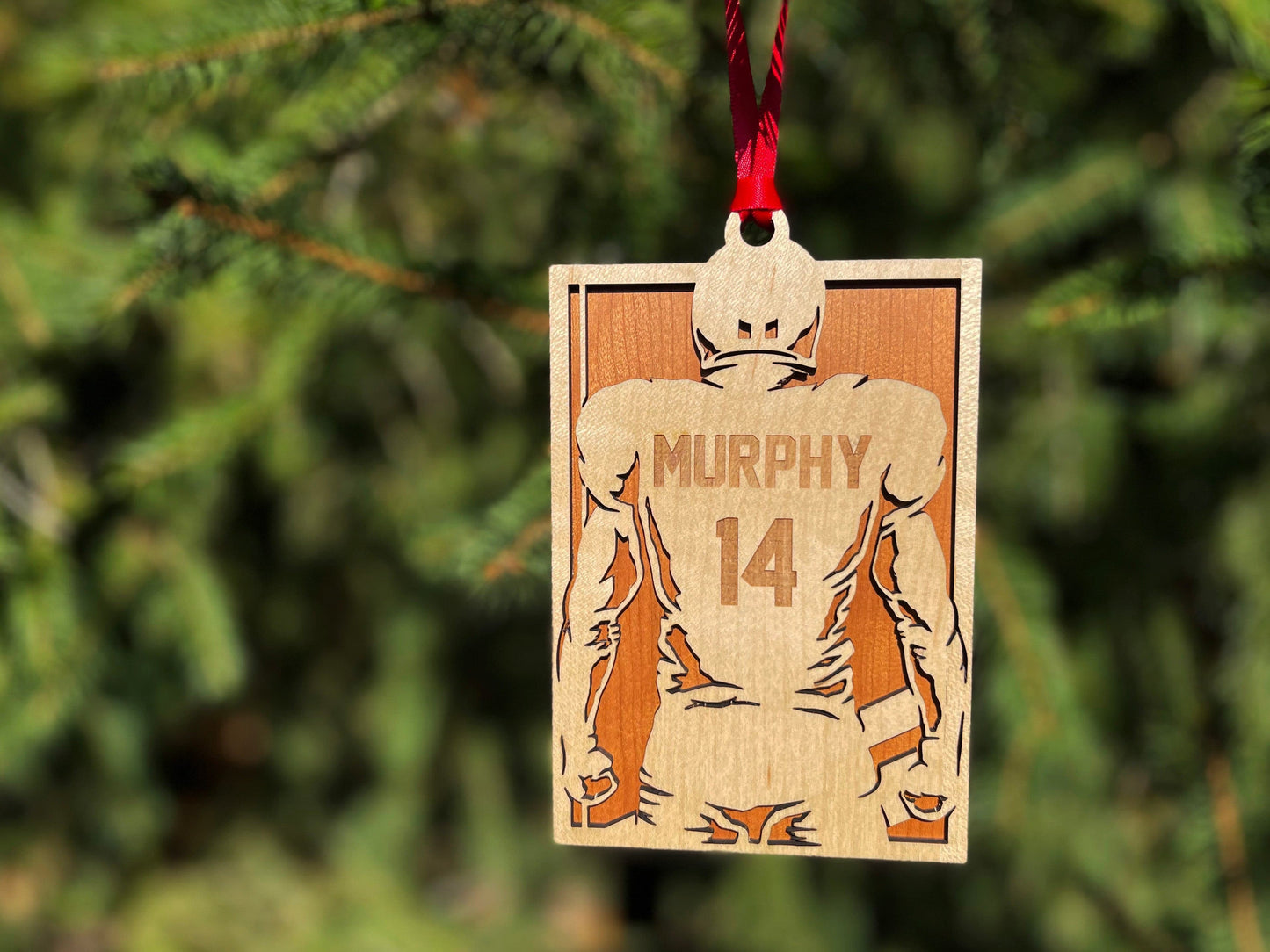 Football Player Jersey Christmas Ornament.