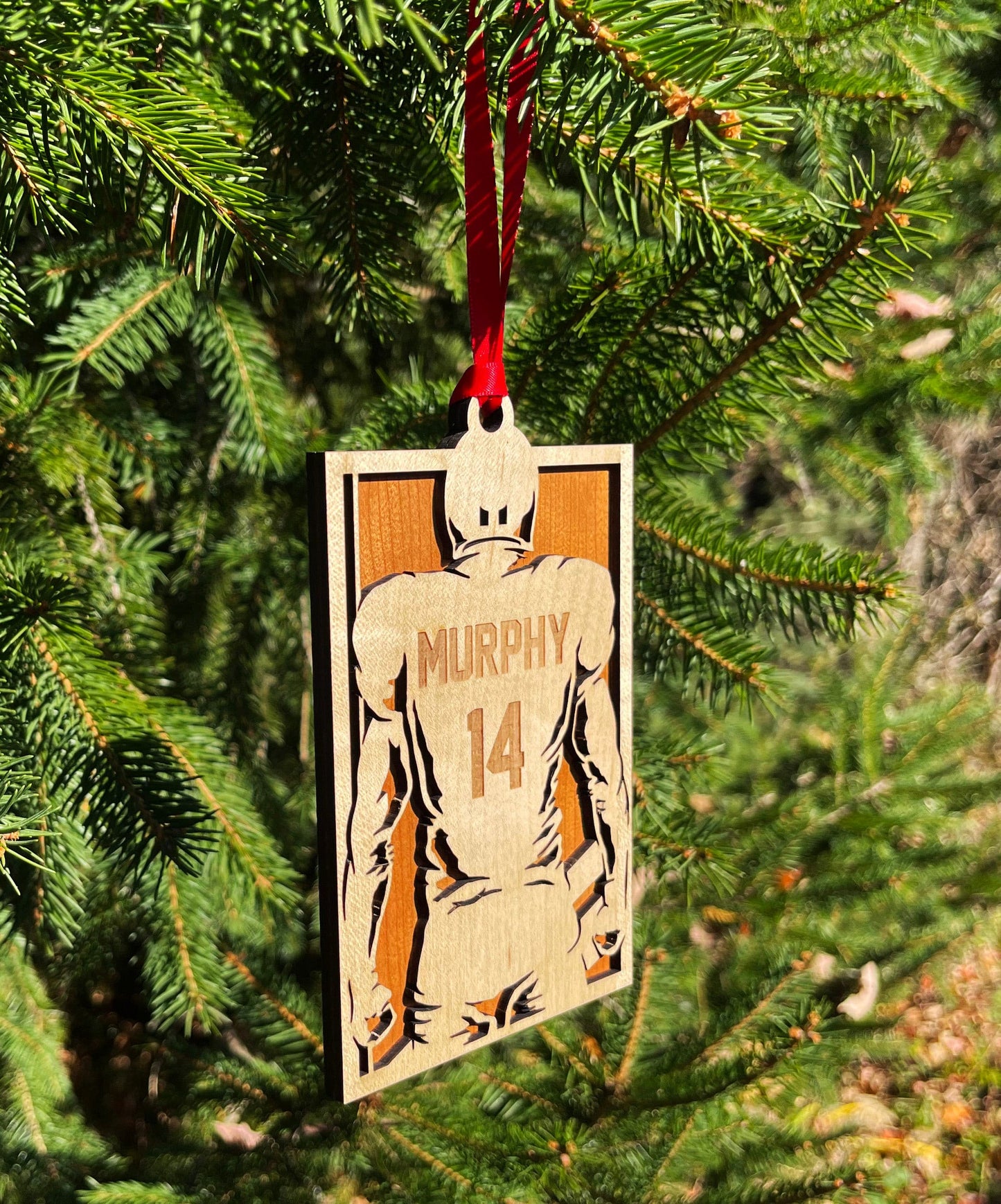 Football Player Jersey Christmas Ornament.