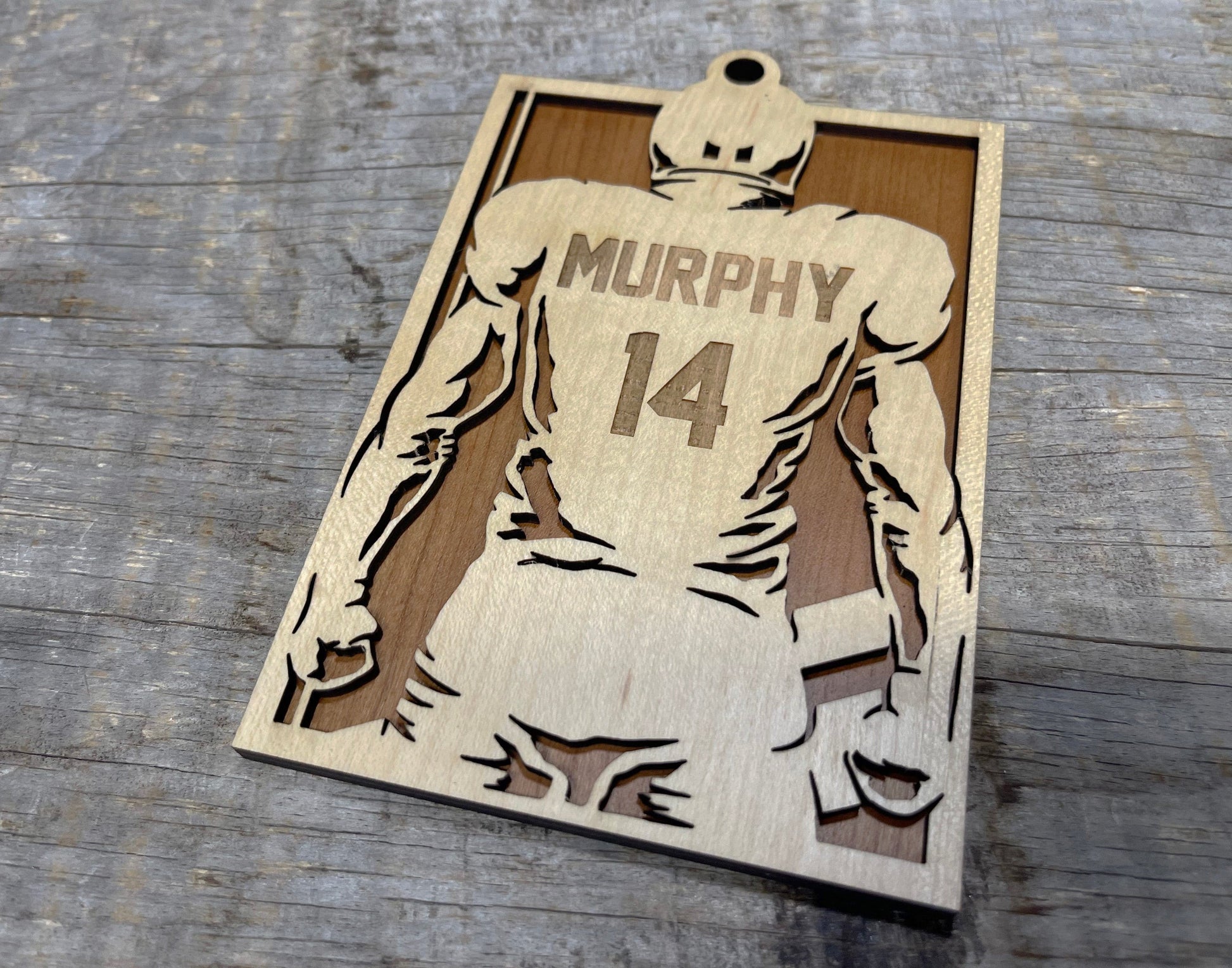 Football Player Jersey Christmas Ornament.