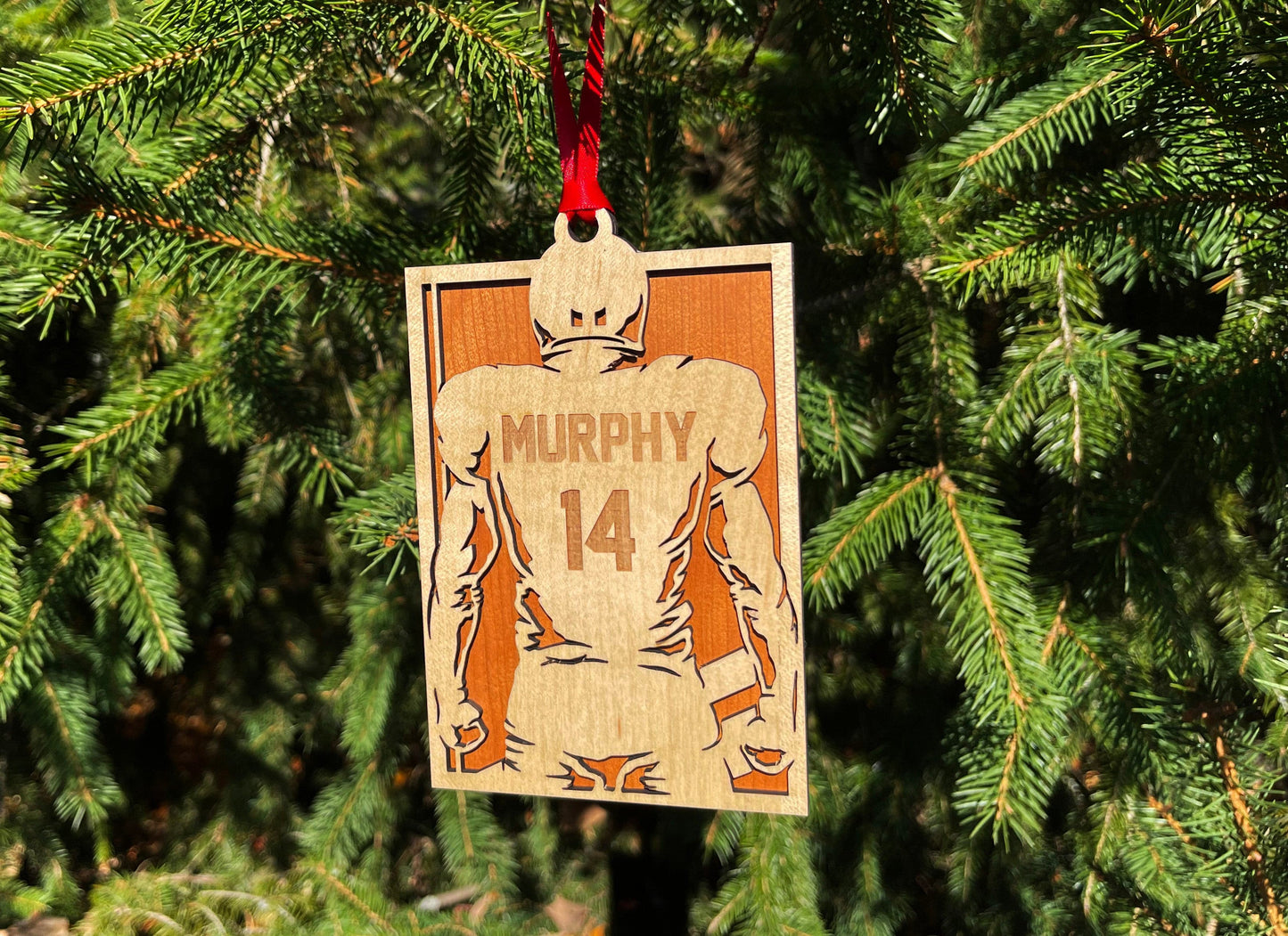 Football Player Jersey Christmas Ornament.