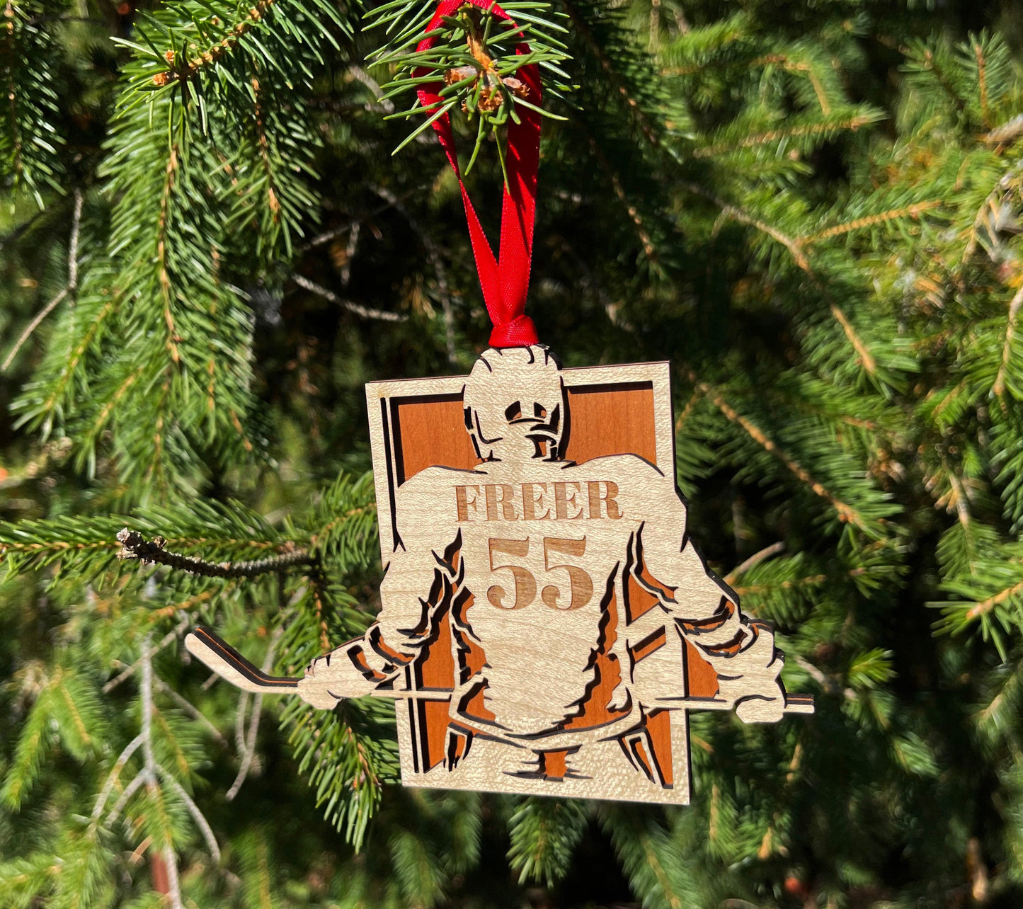 Hockey Player Christmas Ornament.