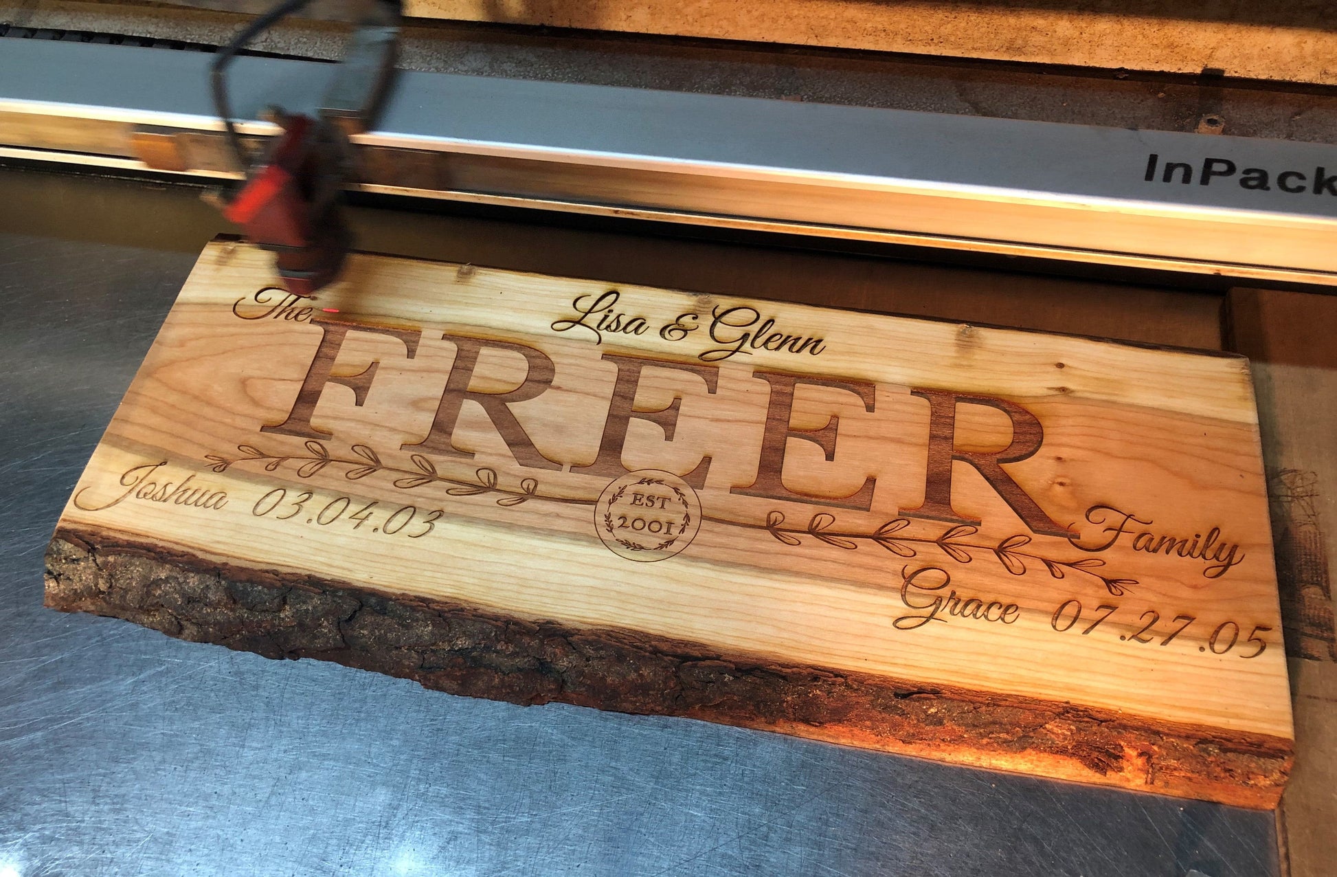 Cherry Wood Custom Signs: Family Name and Dates.